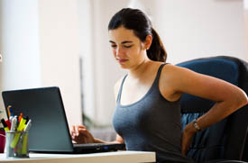 Woman Working With a Sore Back